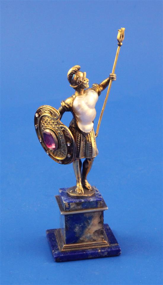 A Vienna style silver gilt, baroque pearl, diamond and cabochon set miniature figure of a warrior with trident, 5in.